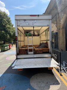 Truck back shot showcasing furniture